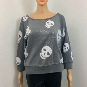 Hard candy sweat shirt with skull print.